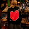 Bad Sisters S02 Eve Hewson Love Heart Sweater